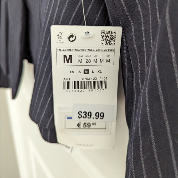 A peplum style blazer. It’s a unique look which I wished I had bought a size up. - Picture 2 of 4